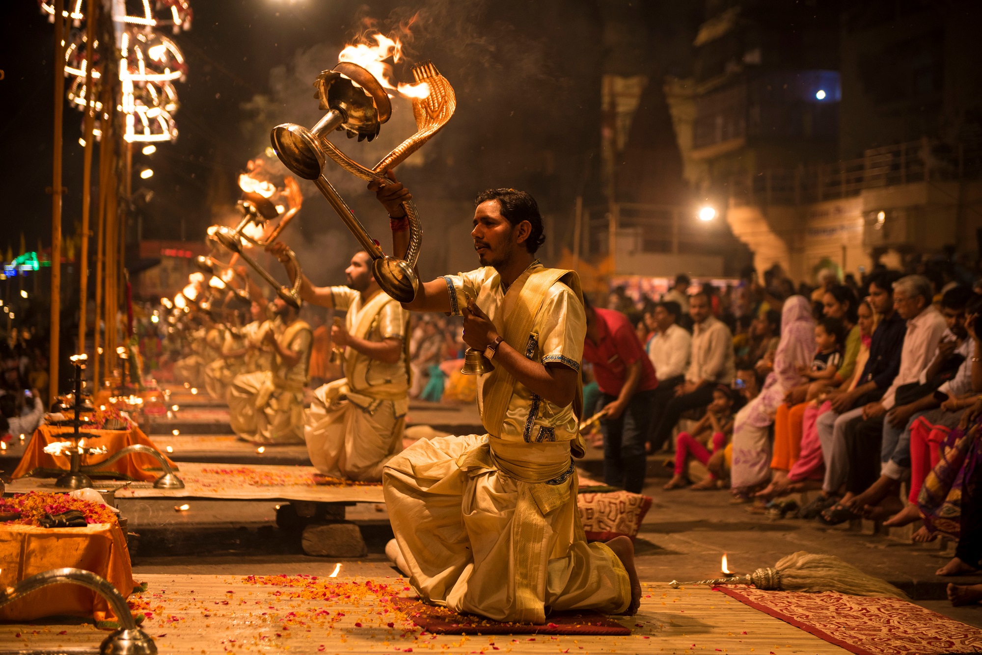 Ganga Aarti ceremony rituals performed by Hindu priests at Dashashwamedh Ghat in Varanasi.
