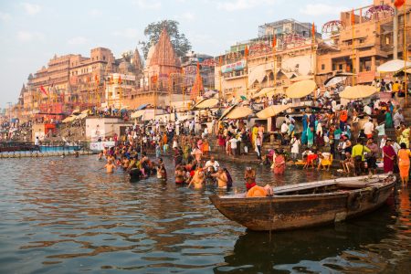 Pilgrims plunge into the water holy Ganges river in the early morning at Varanasi.